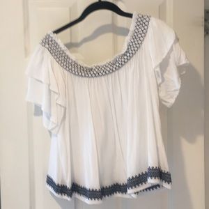 Woman’s off the shoulder shirt